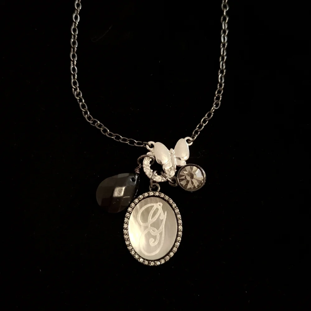 Guess Black and Silver Butterfly Mother of Pearl Necklace - Picture 2 of 2